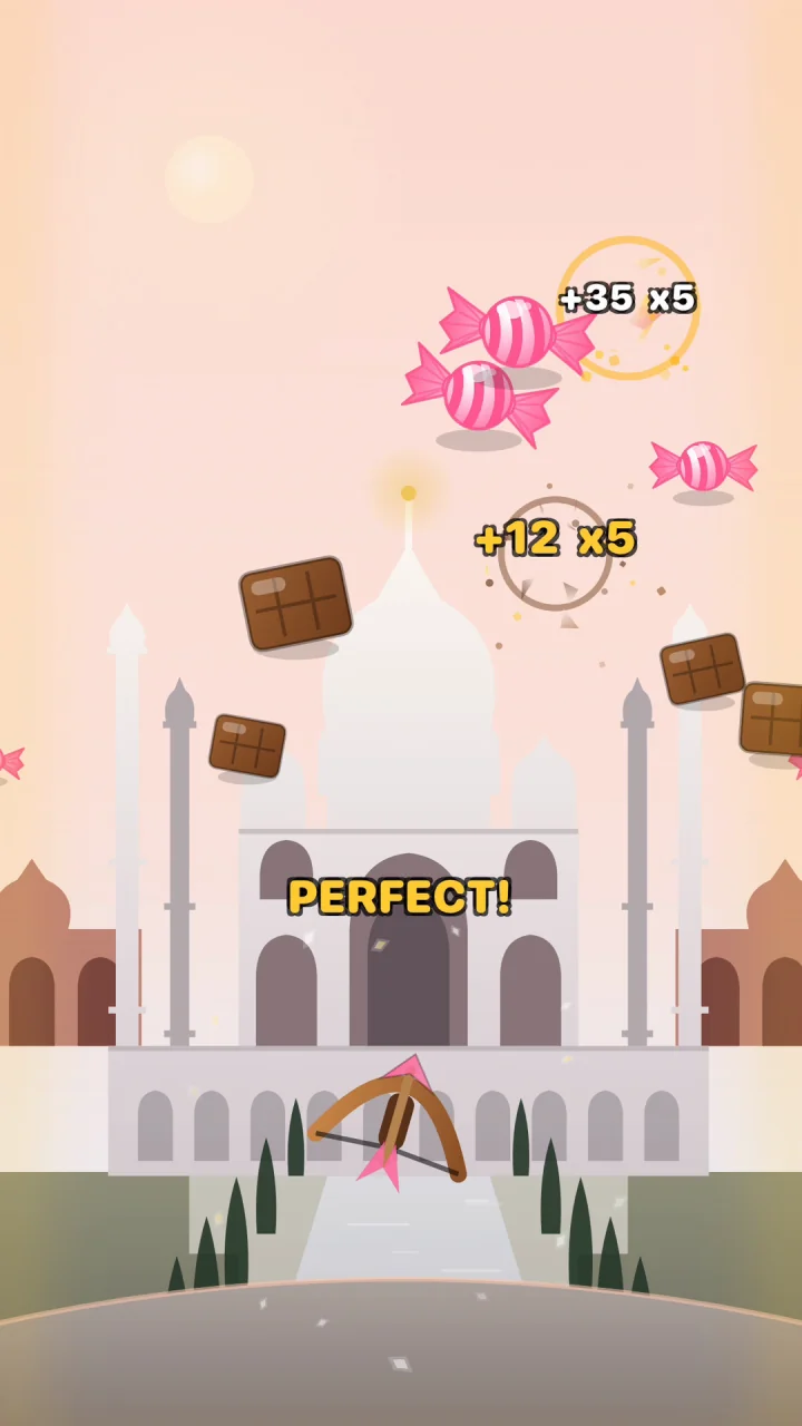 SnackShot gameplay: a bow firing at flying snacks in front of the Taj Mahal, with a PERFECT! combo